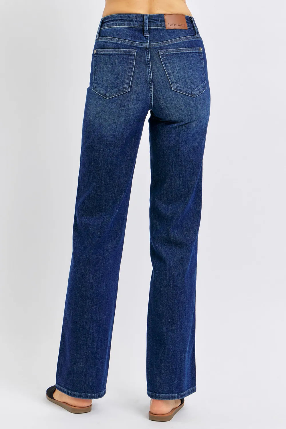 Close-up side view emphasizing the straight fit of Judy Blue Full Size Tummy Control Straight Jeans Plus Size.