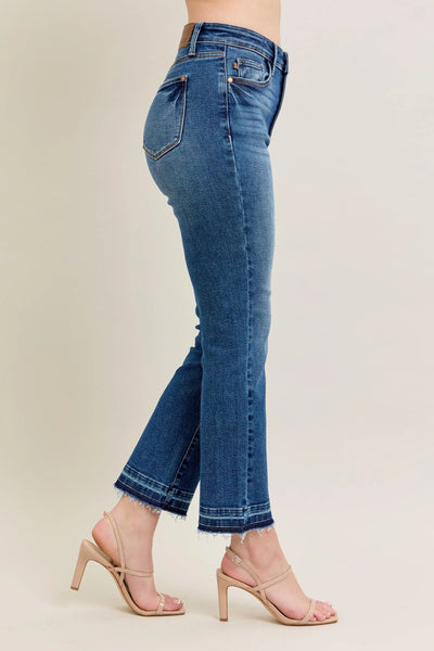 Close-up of the front detailing of Judy Blue Full Size High-Waisted Vintage Wash Release Hem Kick Flare Jeans Plus Size.