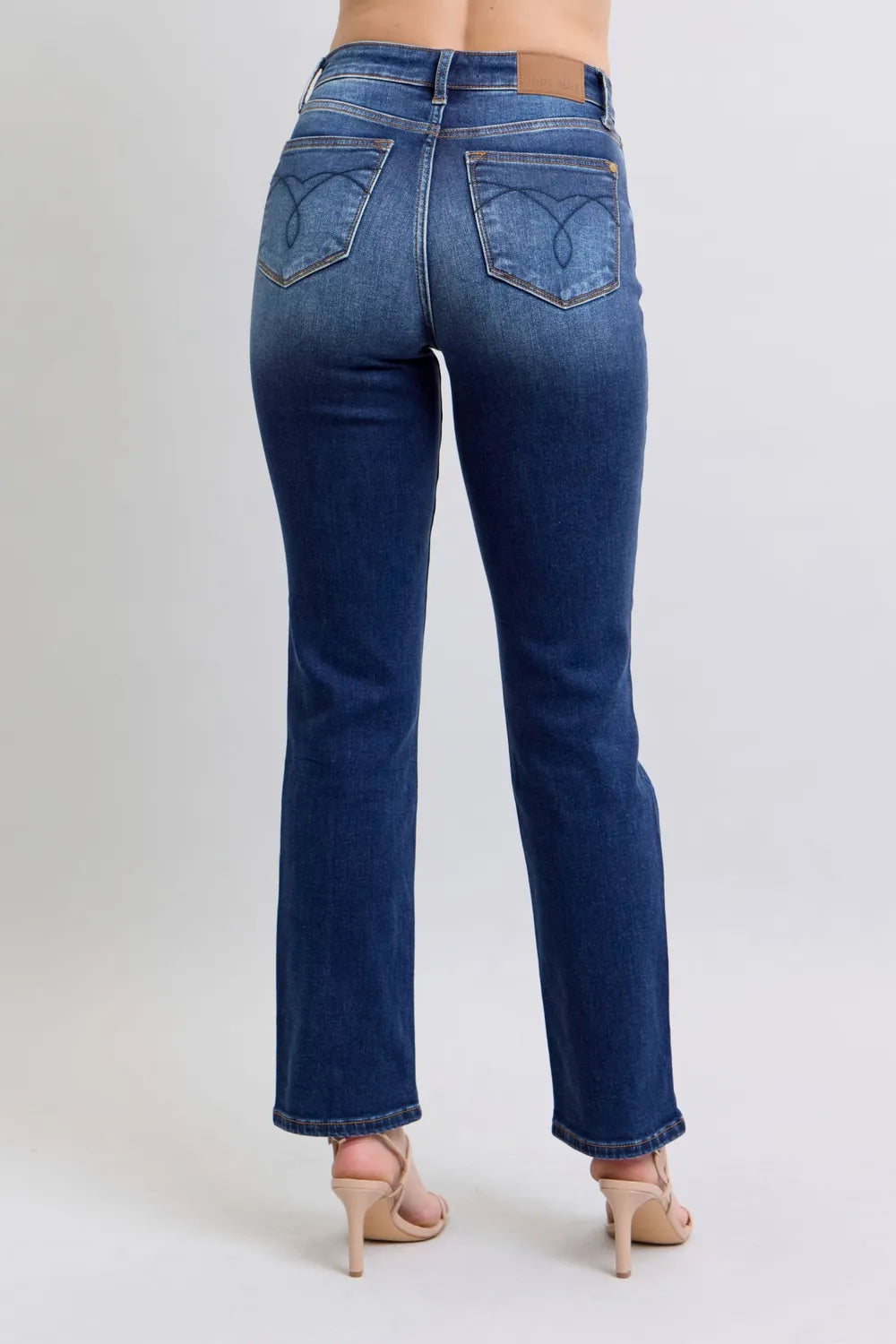 Side view showcasing the fit of Judy Blue Full Size Washed Straight Leg Jeans with Pockets.