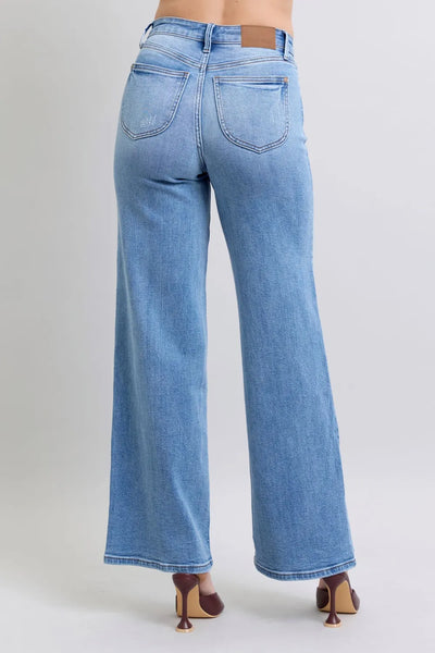 Angled front view of Judy Blue Full Size Wide Leg Jeans with Pockets, showcasing the silhouette.