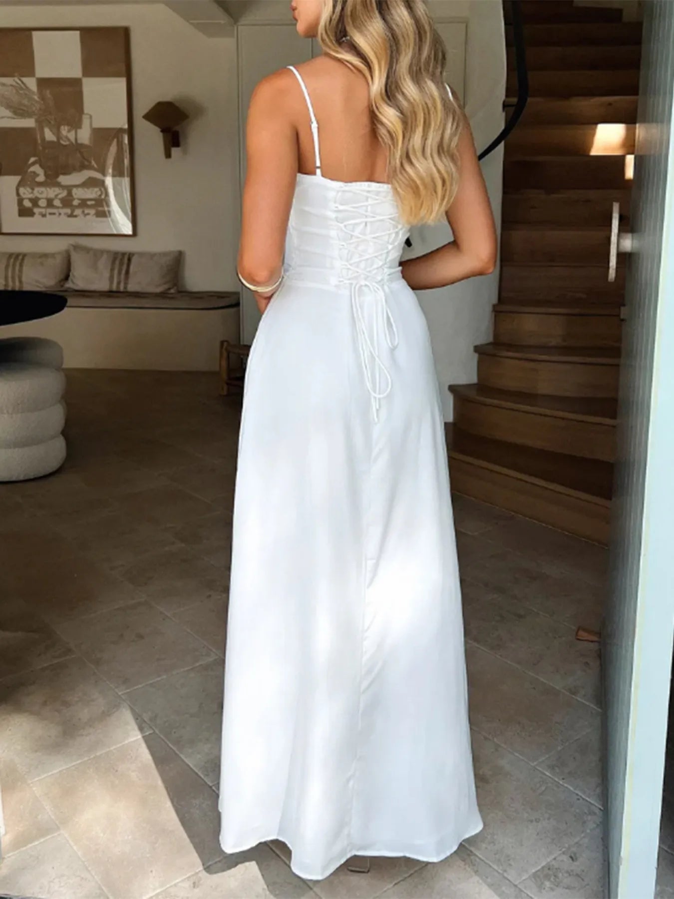 Back view highlighting the Lace-Up Solid Cami Dress in White.