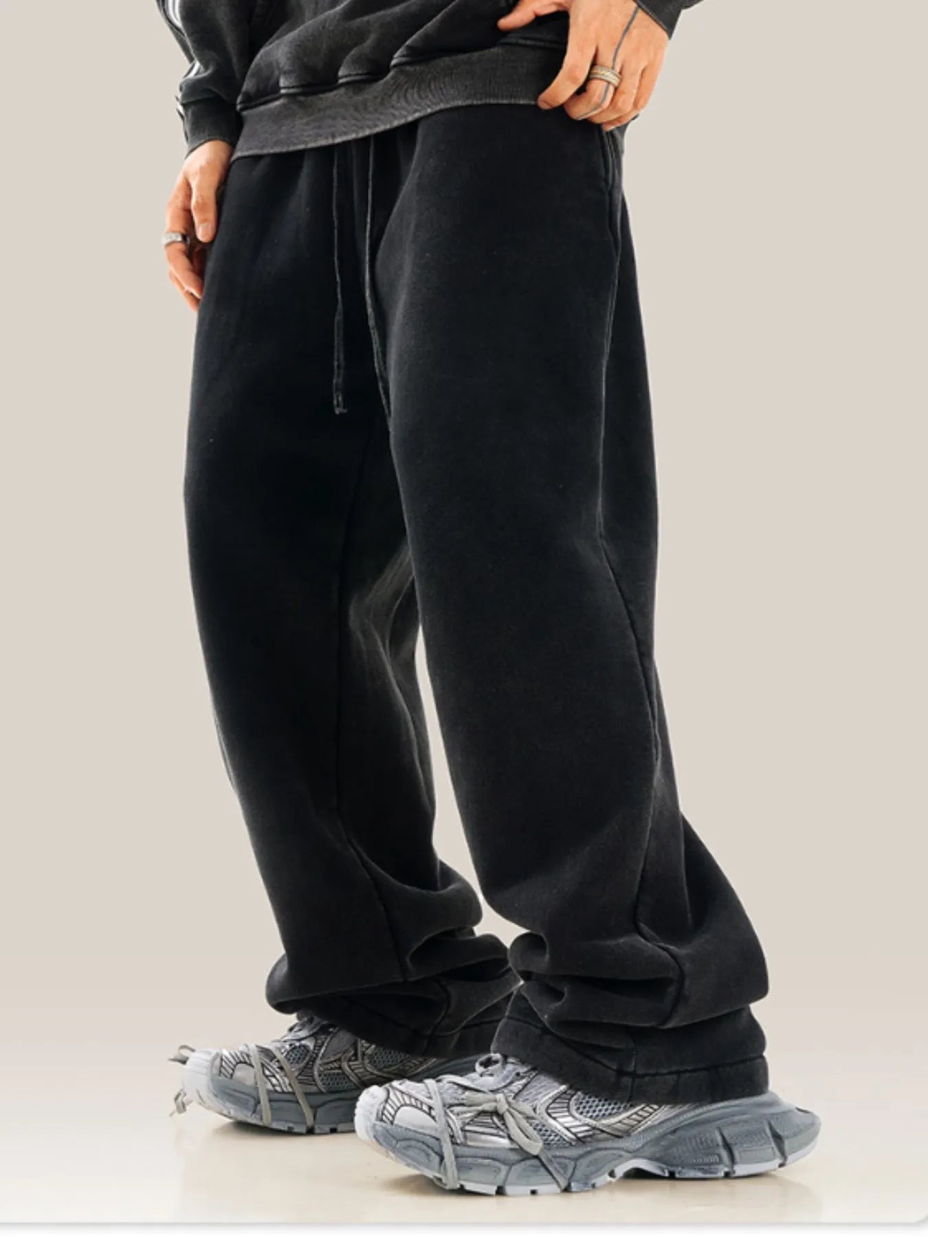 Back view highlighting the design of Men's Drawstring Wide Leg Pants in Black.