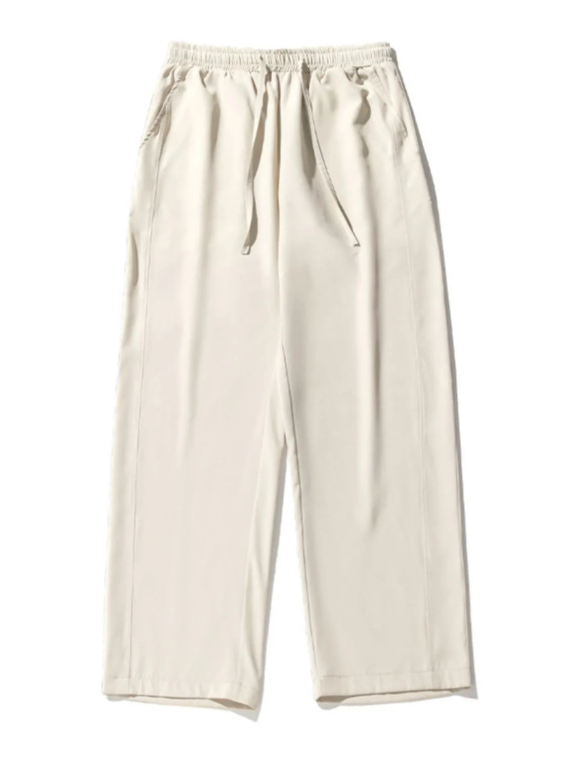 Side view showcasing the fit of Men's Drawstring Wide Leg Pants in Ivory.