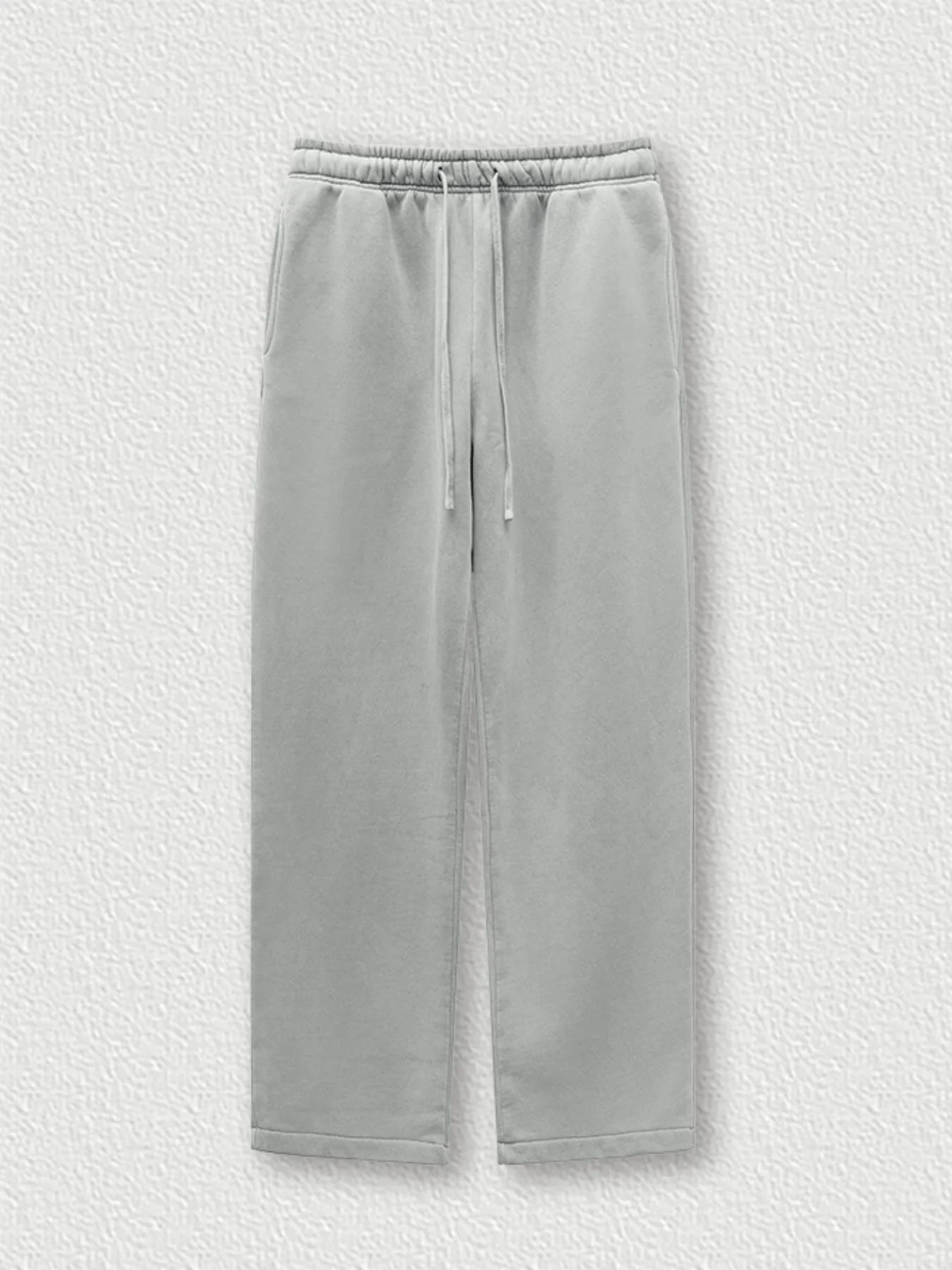 Side view showcasing the fit of Men's Drawstring Wide Leg Pants in Medium Gray.