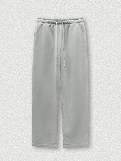 Side view showcasing the fit of Men's Drawstring Wide Leg Pants in Medium Gray.