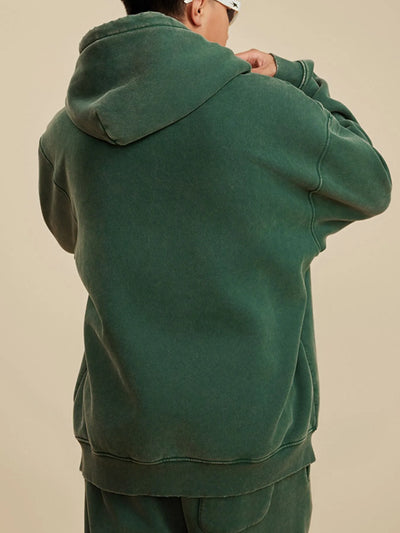Back view highlighting the design of Men's Kangaroo Pocket Dropped Shoulder Hoodie in D.green.
