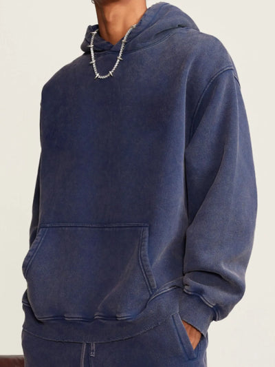 Side view showcasing the fit of Men's Kangaroo Pocket Dropped Shoulder Hoodie in Sapphire Blue.