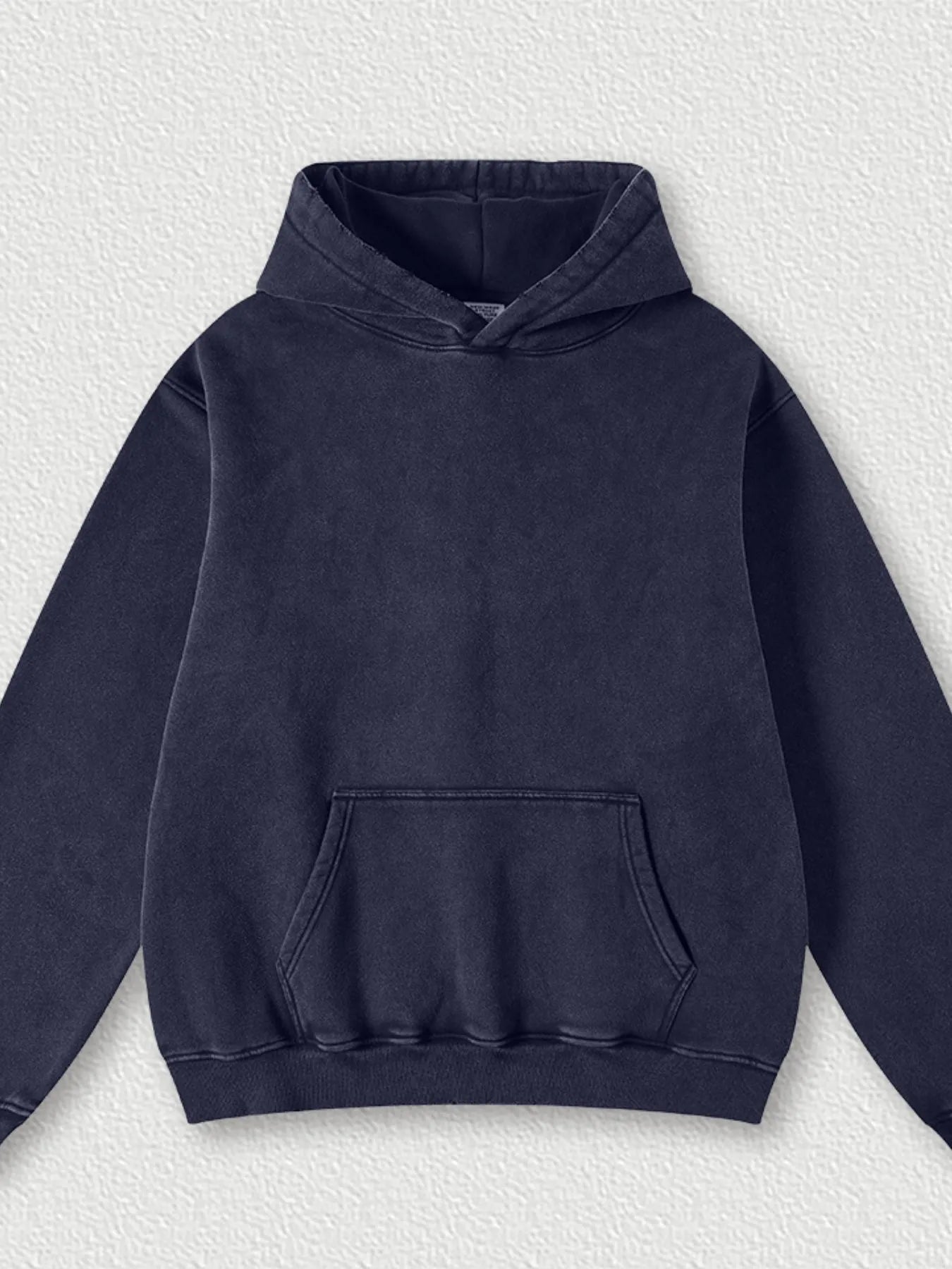 Model wearing Men's Kangaroo Pocket Dropped Shoulder Hoodie in Sapphire Blue from the front.