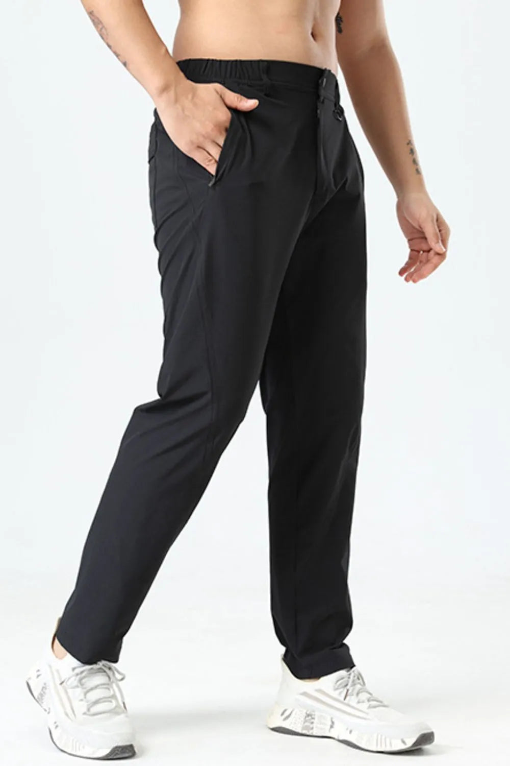 Side view showcasing the fit of Men's Plus Size Casual Pocketed Pants in Black.