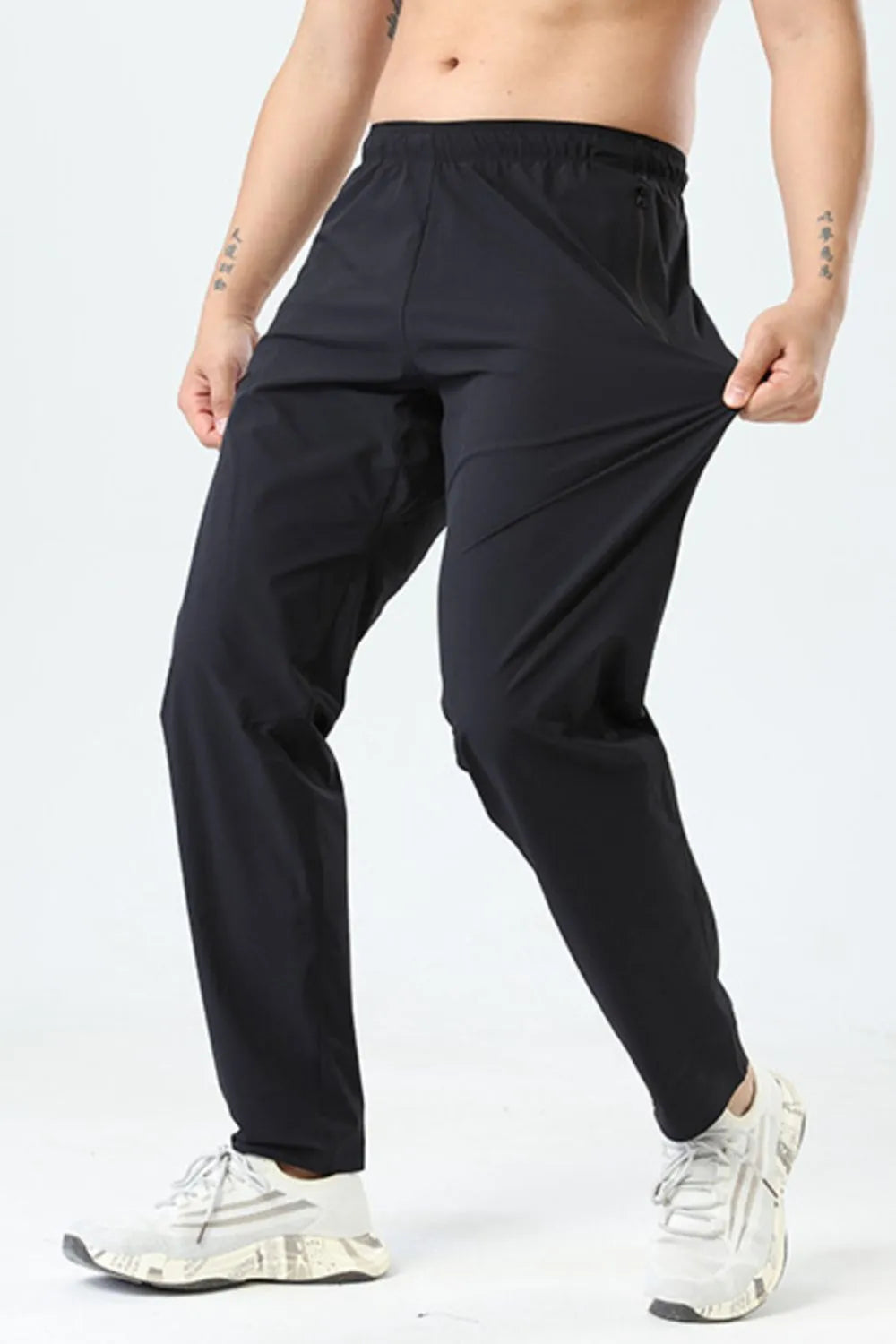 Front view of Men's Plus Size Elastic Waist Loose Fit Pants in Black.