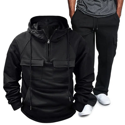 Side view showcasing the fit of Men's Pocketed Drawstring Hoodie and Pants Set in Black.