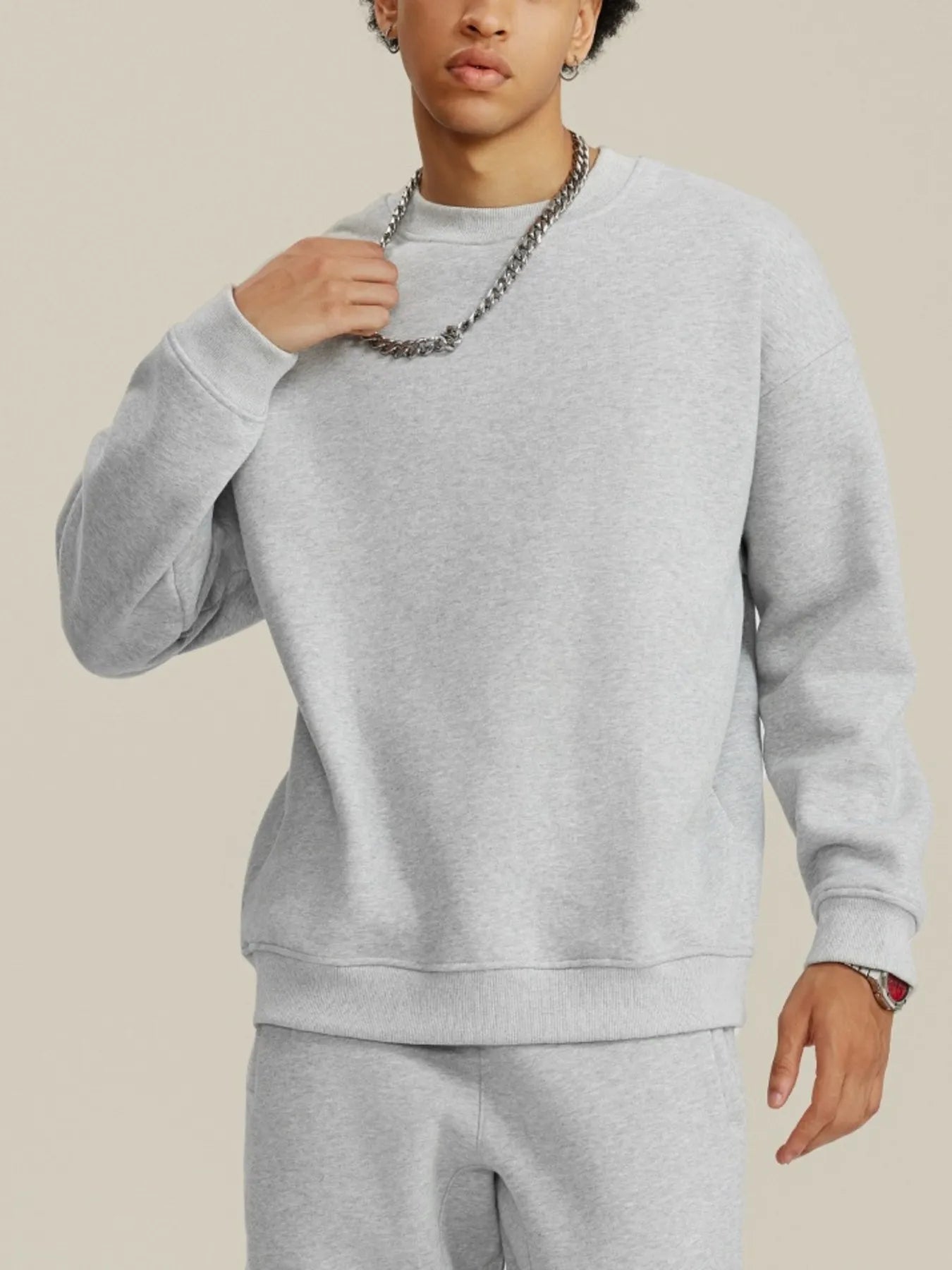 Front view of Men's Round Neck Dropped Shoulder Sweatshirt in White.