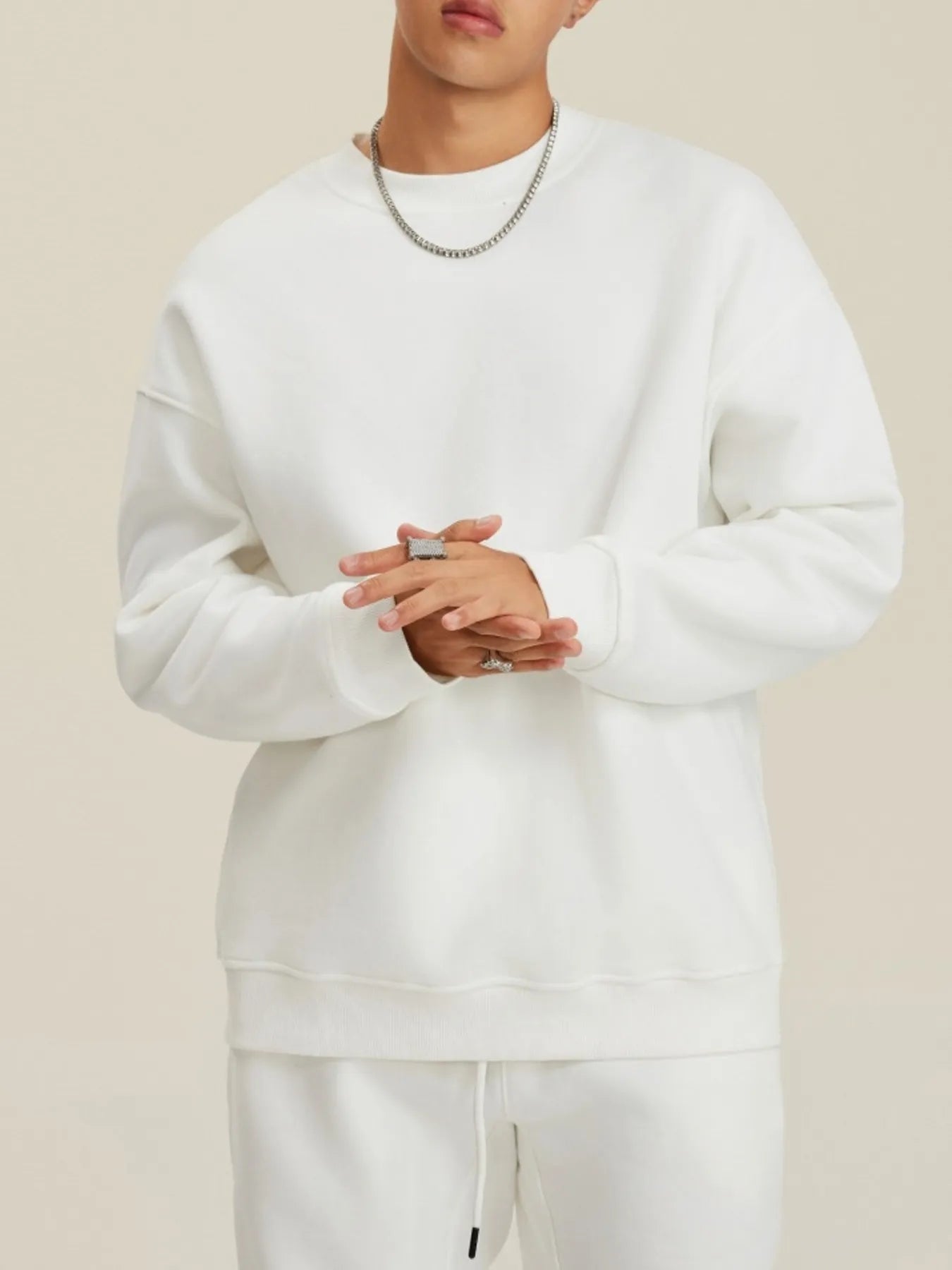 Front view of Men's Round Neck Dropped Shoulder Sweatshirt in White.