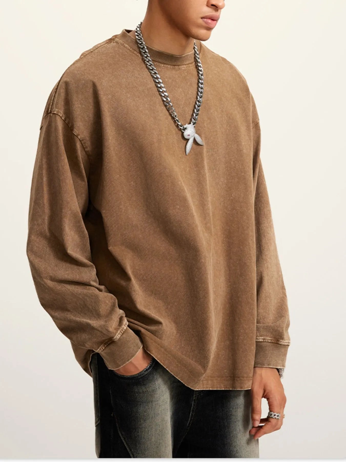 Side view showcasing the fit of Men's Round Neck Long Sleeve T-Shirt in Coffee.