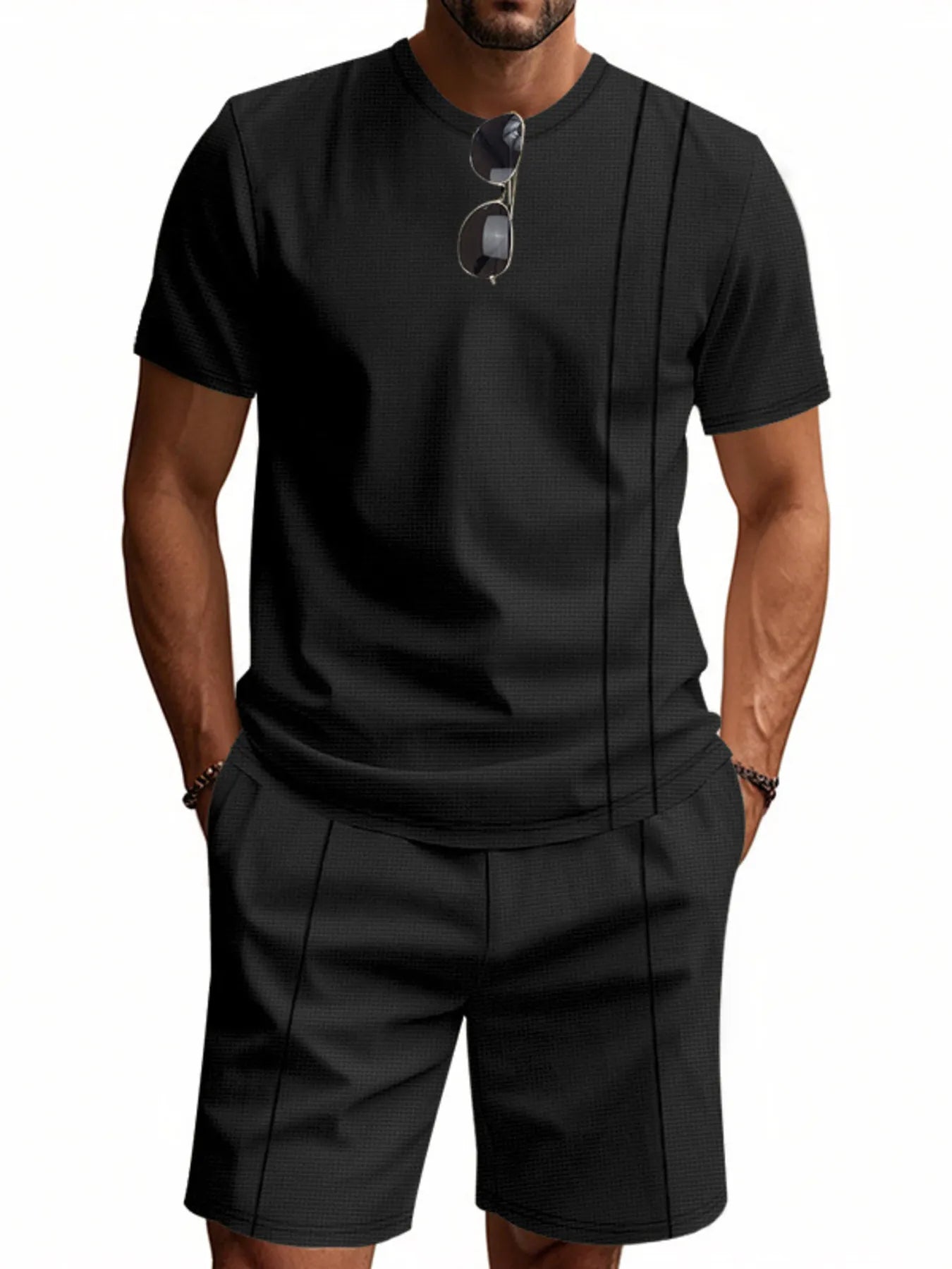Side view showcasing the fit of Men's Round Neck Short Sleeve Top and Shorts Set in Black.