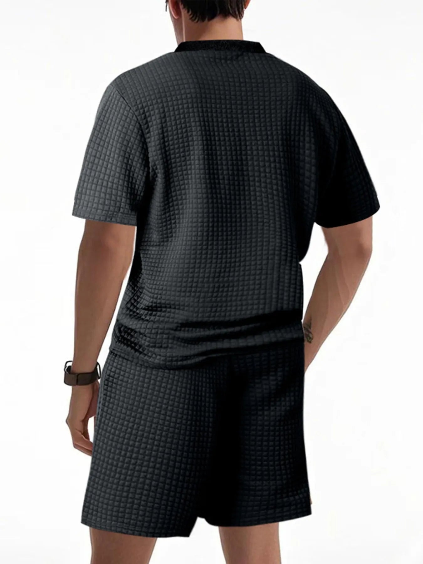 Side view showcasing the fit of Men's Textured Round Neck Top and Shorts Set in Black.