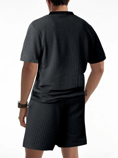 Side view showcasing the fit of Men's Textured Round Neck Top and Shorts Set in Black.