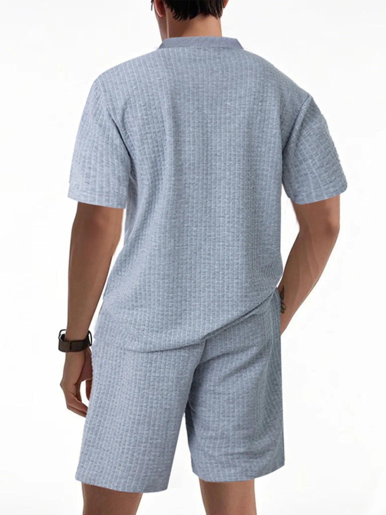 Side view showcasing the fit of Men's Textured Round Neck Top and Shorts Set in Light Gray.