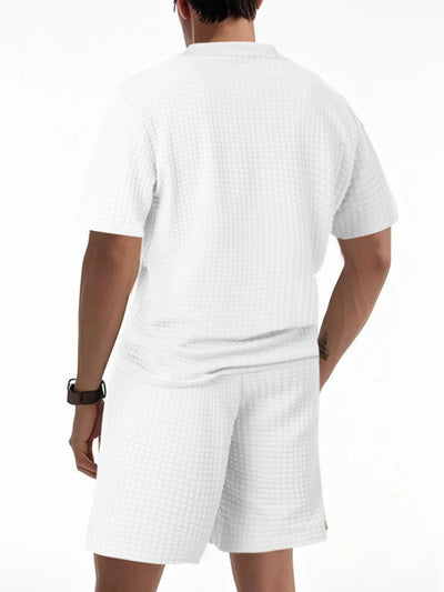 Side view showcasing the fit of Men's Textured Round Neck Top and Shorts Set in White.