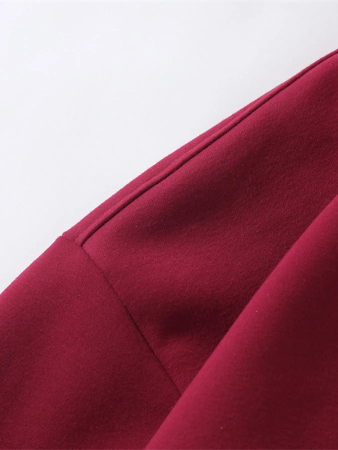 Close-up of the zipper detail on Men's Zip-Up Hooded Jacket in Red.