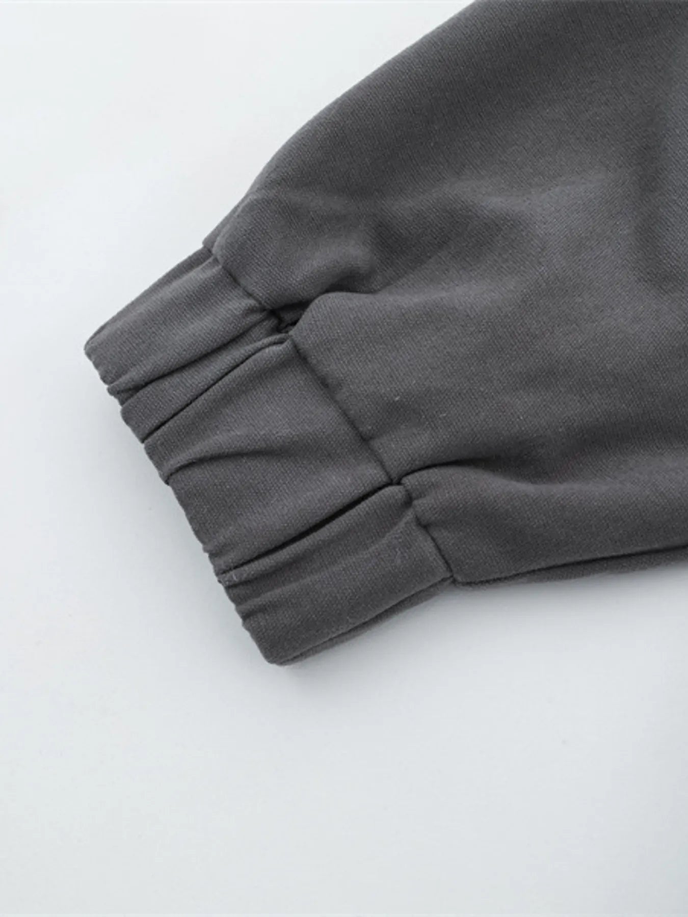 Side view showcasing the fit of Men's Zip-Up Long Sleeve Jacket in Dark Gray.