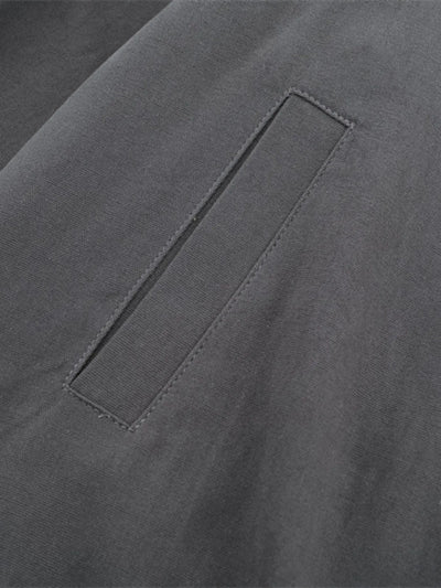 Model wearing Men's Zip-Up Long Sleeve Jacket in Dark Gray.