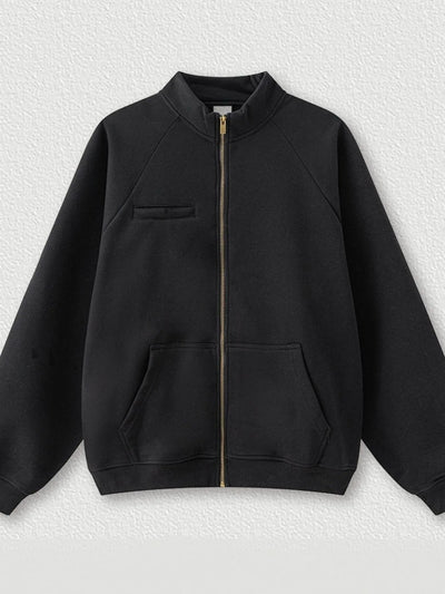 Model wearing Men's Zip-Up Raglan Sleeve Sweatshirt in Black.