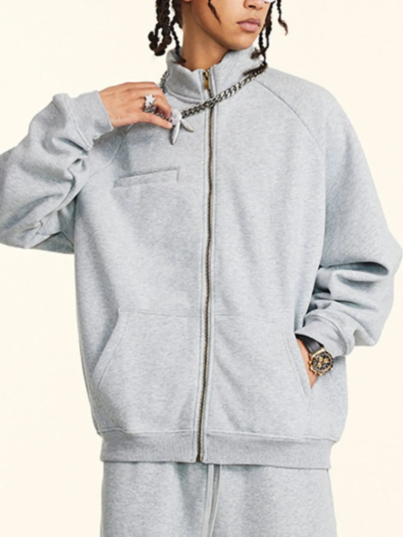 Close-up of the zipper detail on Men's Zip-Up Raglan Sleeve Sweatshirt in Gray.