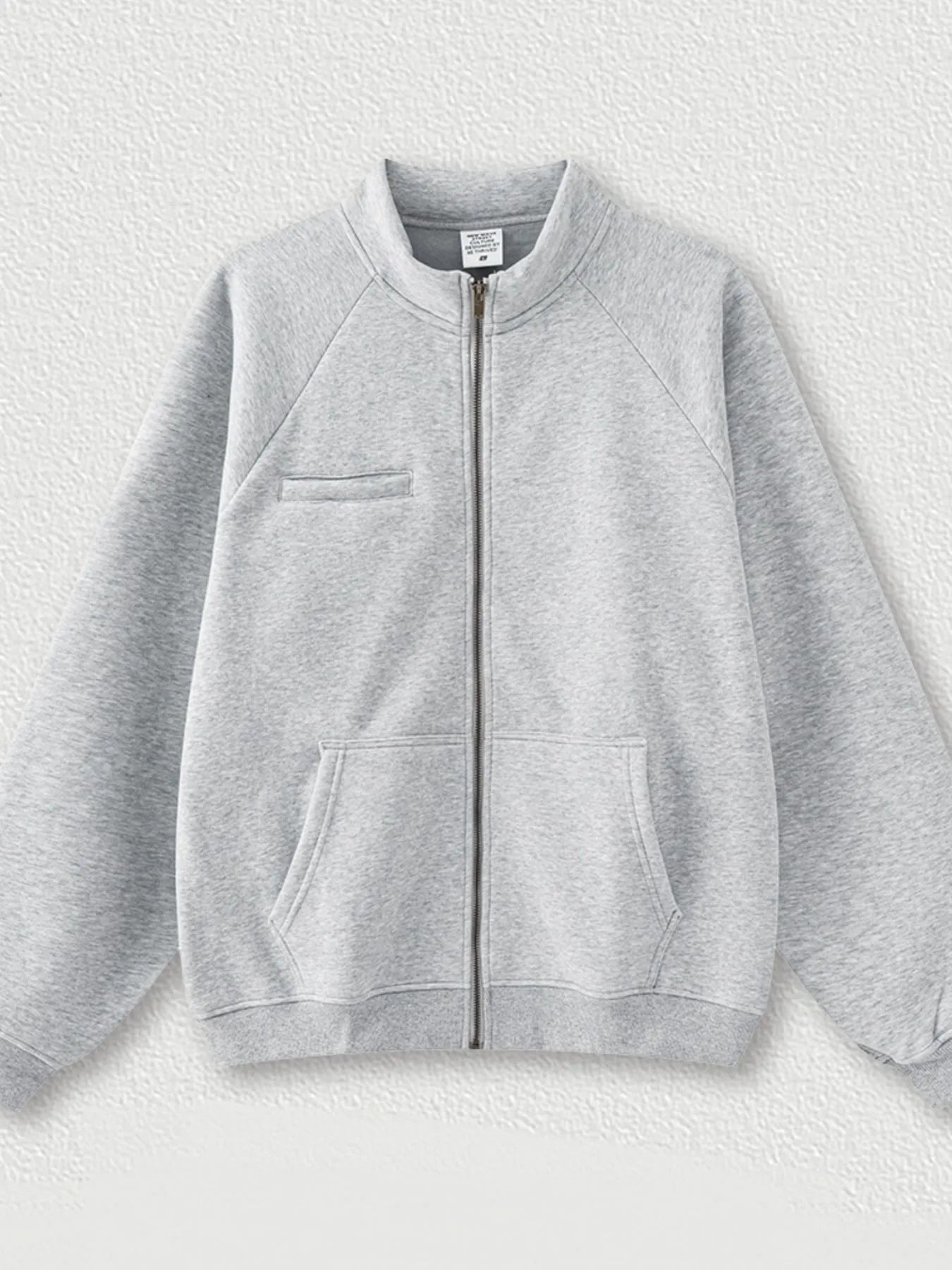 Flat lay of Men's Zip-Up Raglan Sleeve Sweatshirt in Gray.