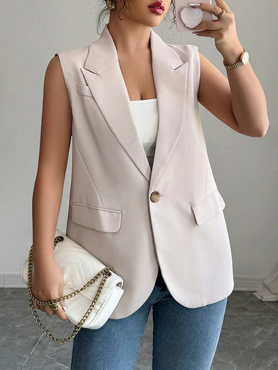 Front view of One Button Sleeveless Blazer in Eggshell.