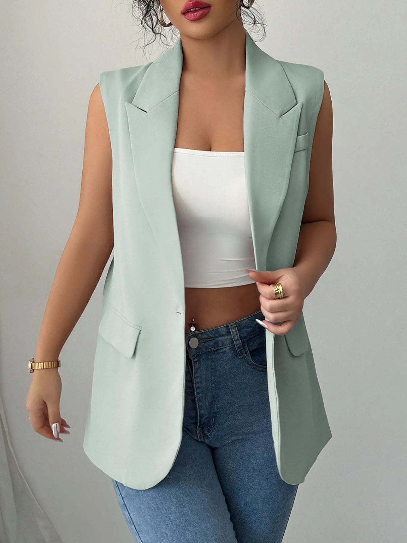 Back view highlighting the design of One Button Sleeveless Blazer in Sage.