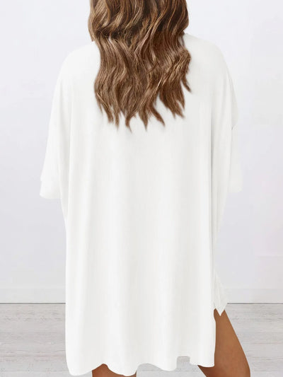 Angled front view close-up of the shorts in Full Size Oversized Slit Round Neck Lounge Set, emphasizing fit and comfort.