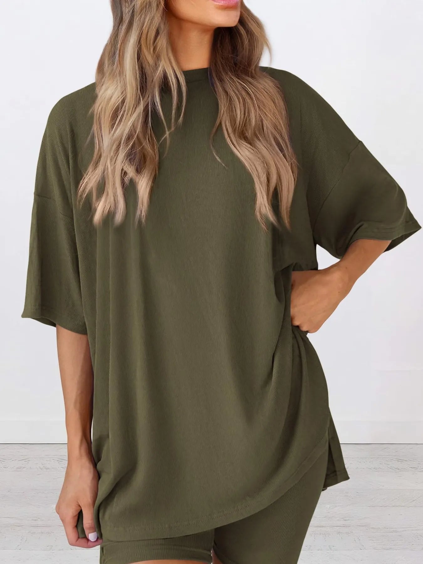 Side view of Full Size Oversized Slit Round Neck Top and Shorts Lounge Set, highlighting the relaxed fit and slit detail on the top.