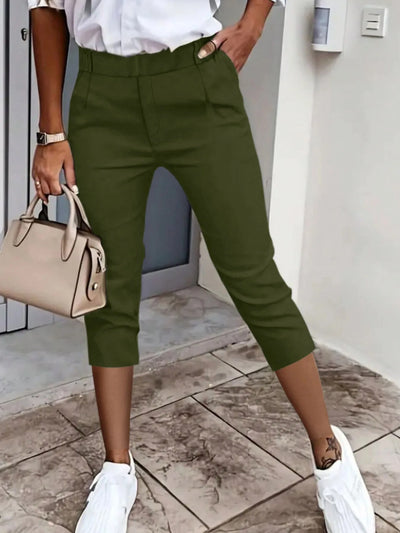 Front view of pleated detail pants in black forest