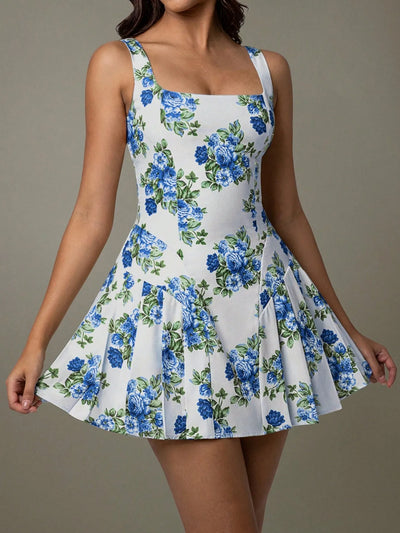 Back view highlighting the design of pleated floral square neck mini dress in blue