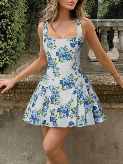 Model wearing pleated floral square neck mini dress in blue