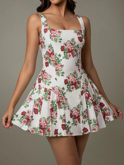 Front view of pleated floral square neck mini dress in deep red