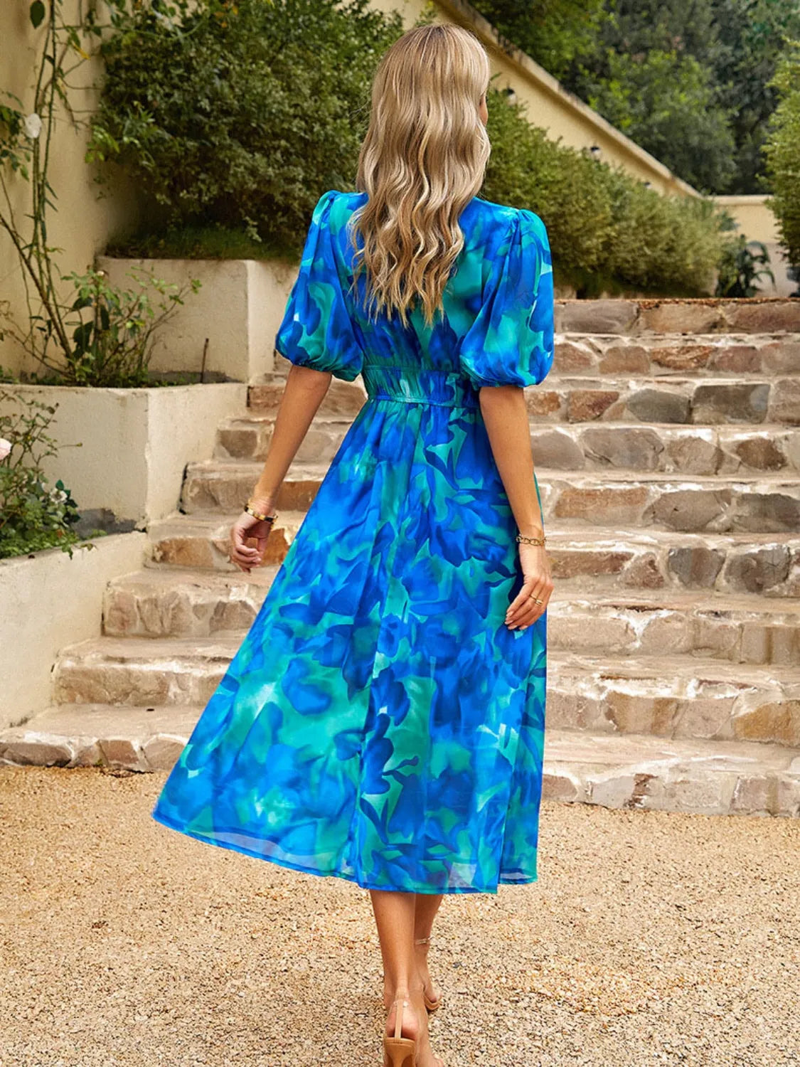 Close-up of puff sleeve and floral pattern detail on Blue Printed Puff Sleeve Midi Dress
