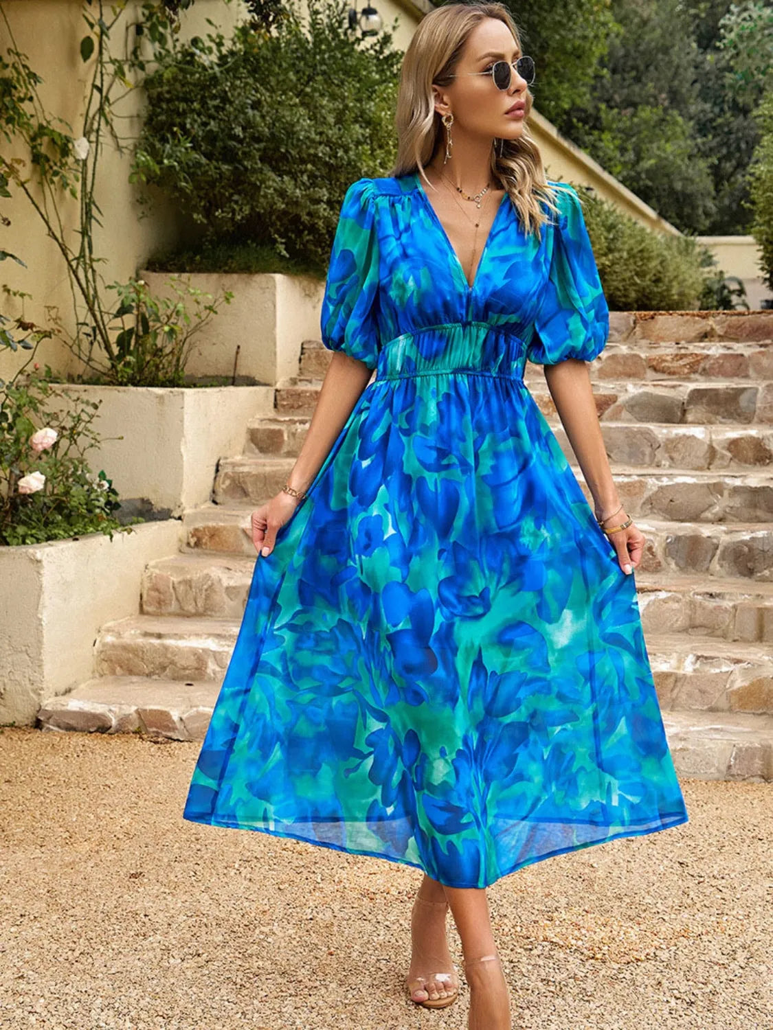 Model wearing Printed Puff Sleeve Midi Dress in Blue