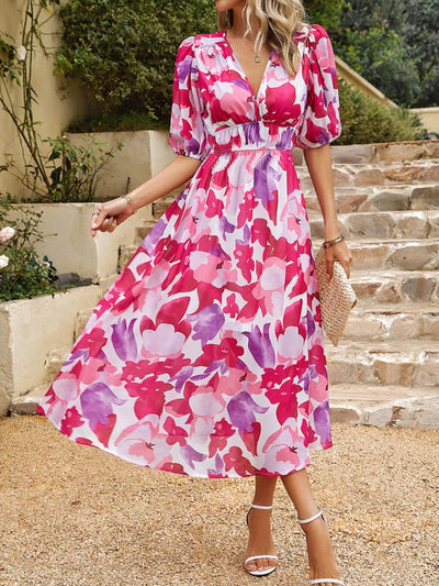 Model wearing Printed Puff Sleeve Midi Dress in Hot Pink