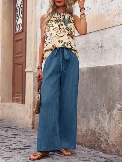 Side view showcasing the fit of Printed Tank Top and Wide Leg Pants Set in Cerulean