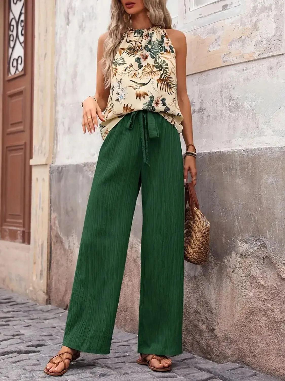 Close-up of tank top and wide leg pants in Dark Green