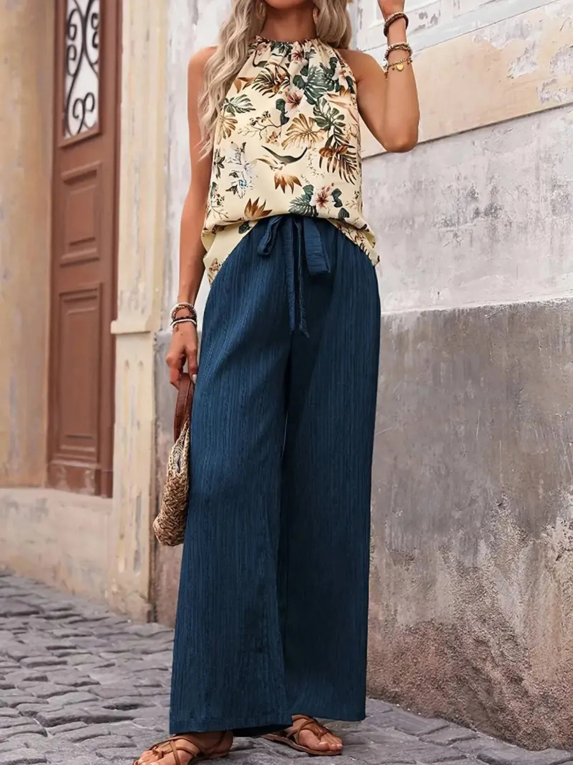 Side view showcasing the fit of Printed Tank Top and Wide Leg Pants Set in Peacock Blue
