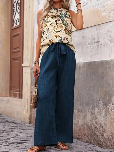 Side view showcasing the fit of Printed Tank Top and Wide Leg Pants Set in Peacock Blue