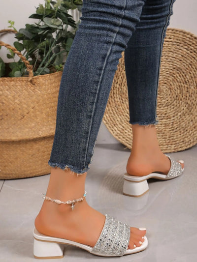 Close-up of rhinestone embellishments on Silver Open Toe Block Heel Sandals