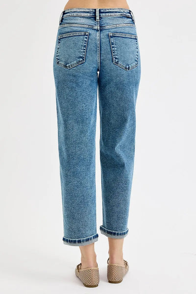 Close-up of the cropped hem on Risen High Rise Crop Boyfriend Jeans, showcasing the trendy and stylish finish.