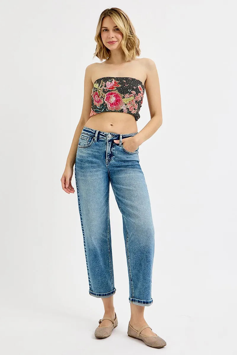 Model wearing Risen High Rise Crop Boyfriend Jeans, demonstrating the relaxed boyfriend fit and cropped design.
