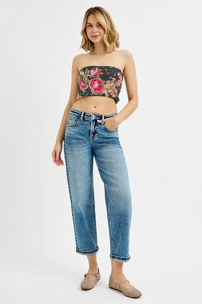 Model wearing Risen High Rise Crop Boyfriend Jeans, demonstrating the relaxed boyfriend fit and cropped design.