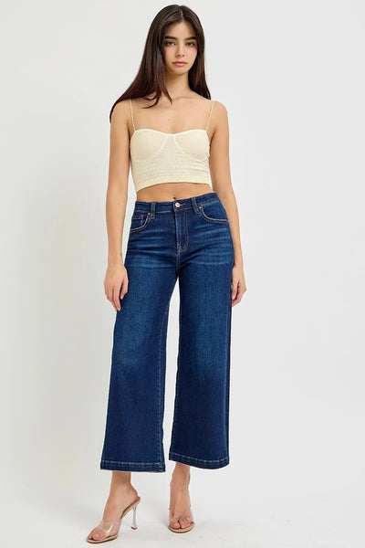 Model wearing Risen High Rise Crop Wide Jeans, showcasing the stylish high-rise fit and wide-leg design.