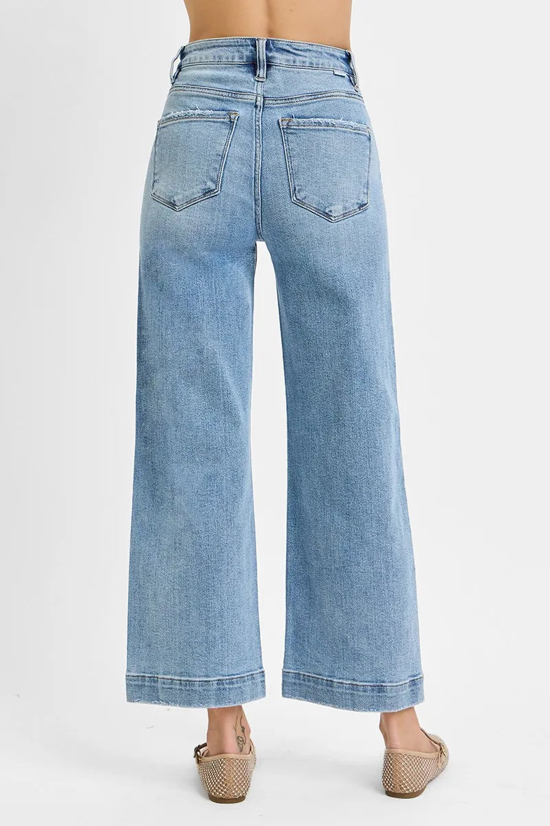 Close-up of the cropped ankle hem on Risen High Rise Crop Wide Leg Jeans, showcasing the trendy wide-leg silhouette.